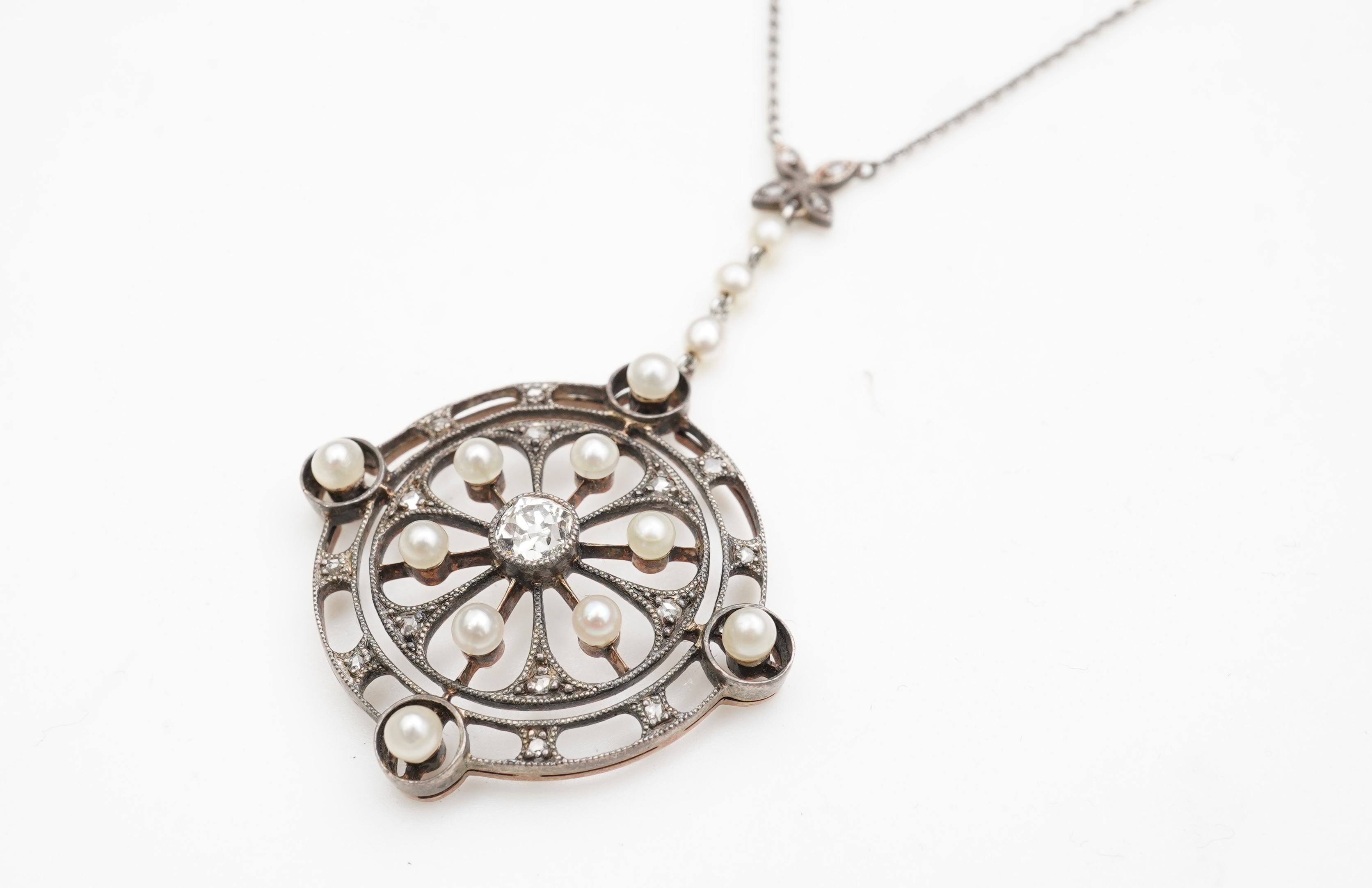 An Edwardian diamond and pearl pendant, early 20th century